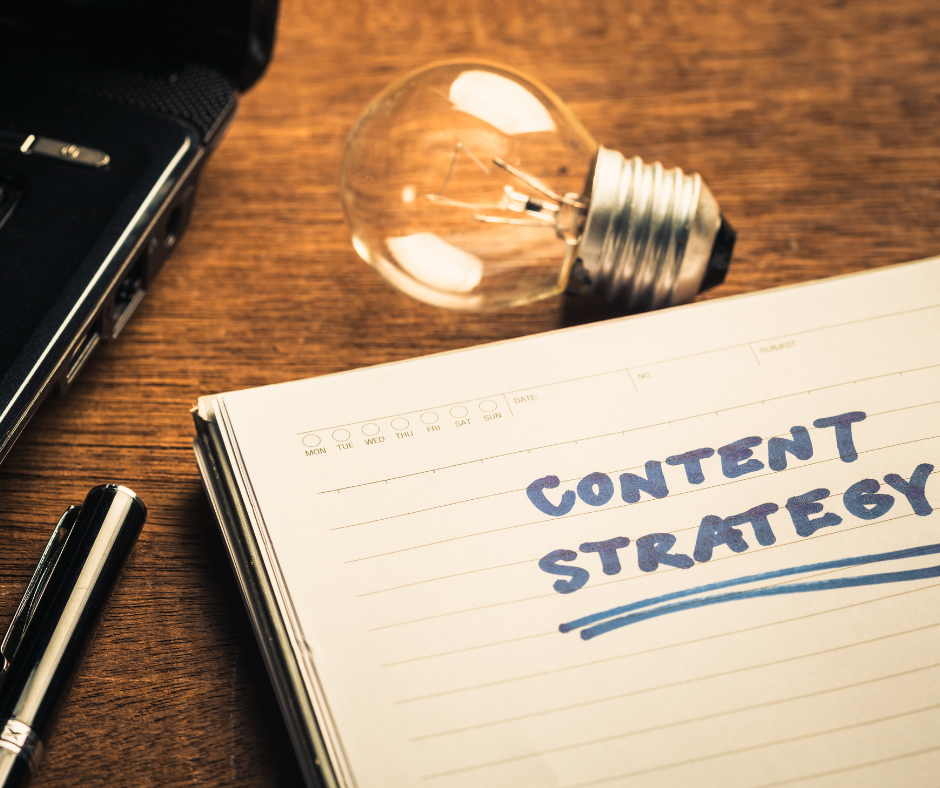 blogs and content creation |YoushTech |Empowering small businesses to thrive online in oklahoma and elsewhere- image of a notepad with the words "content strategy" written on it next to a lightbulb