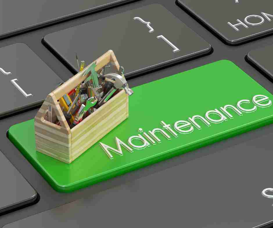 Website Maintenance Services by YoushTech. image of a keyboard with a green tile that says "maintenance" with a tiny toolbox sitting atop the keyboard tile.