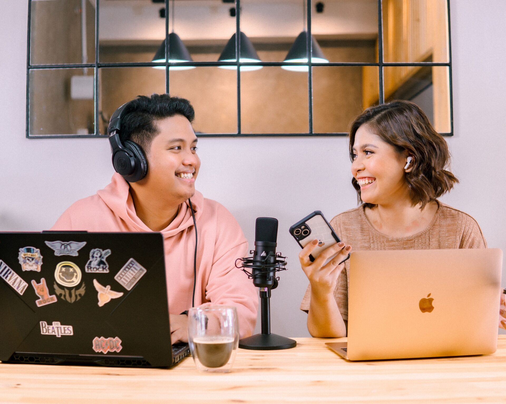 Business professionals recording a podcast interview