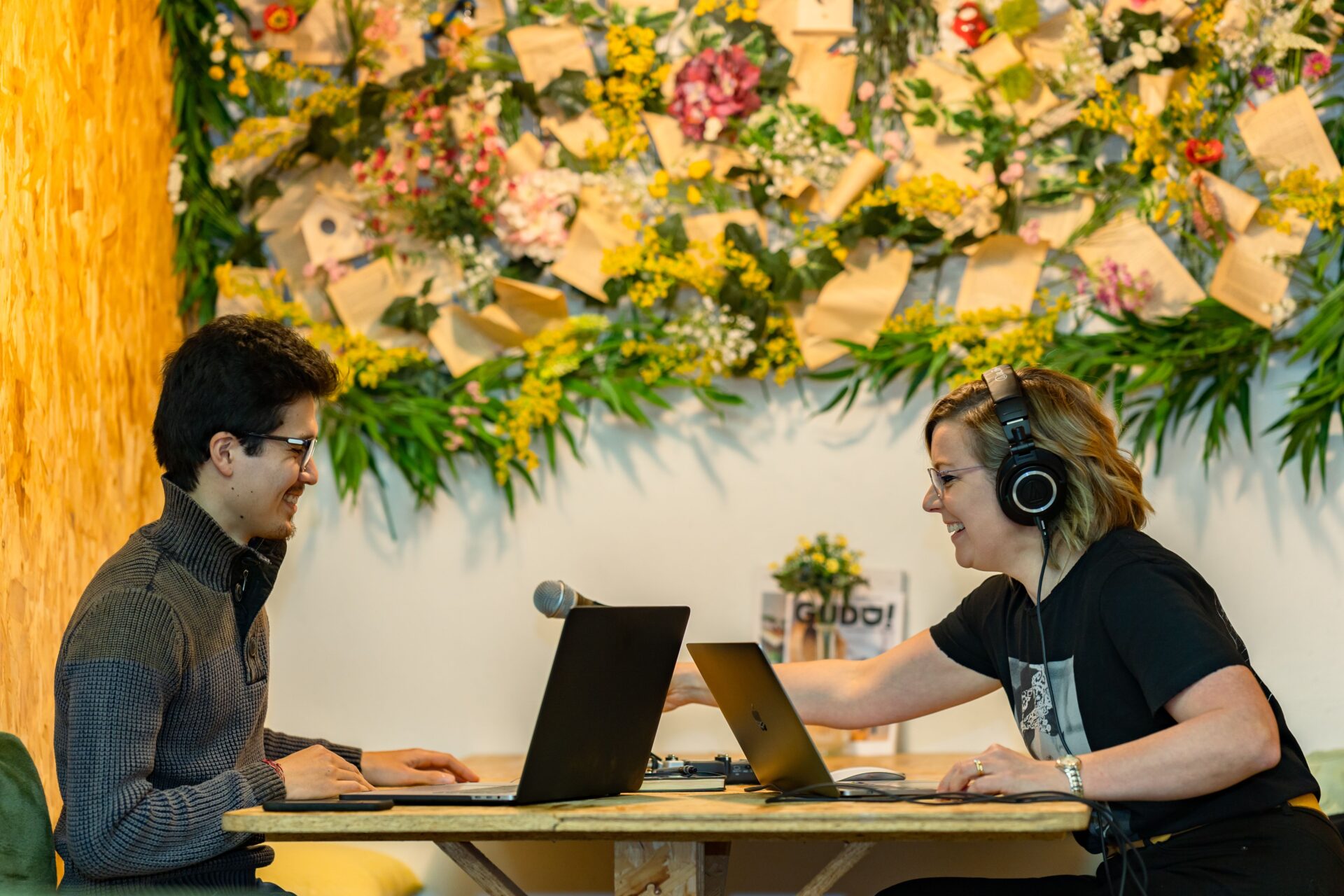 Podcast host interviewing a guest during a recorded episode